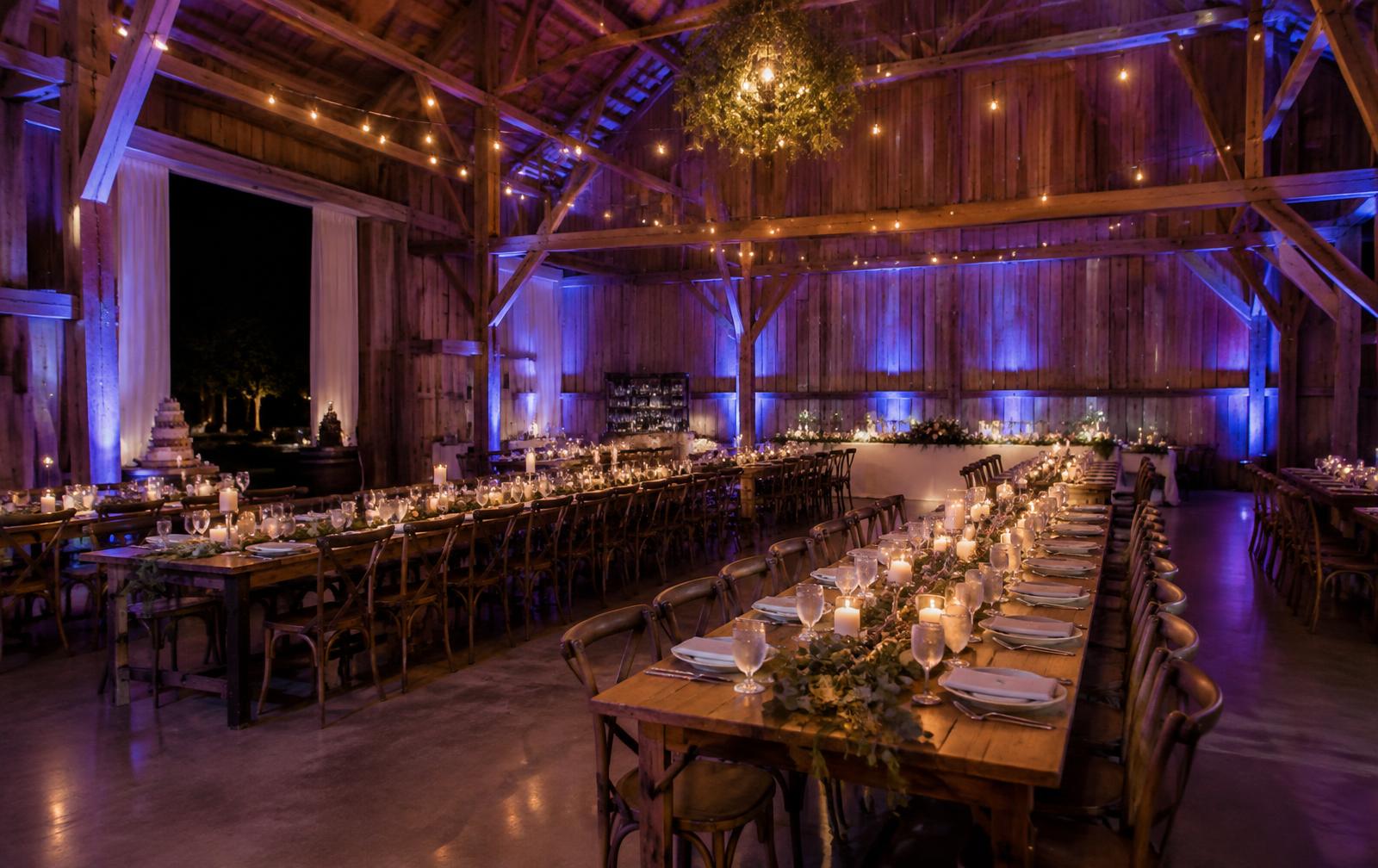 Rustic barn reception shown without uplighting and with blue and violet uplighting — with with uplighting
